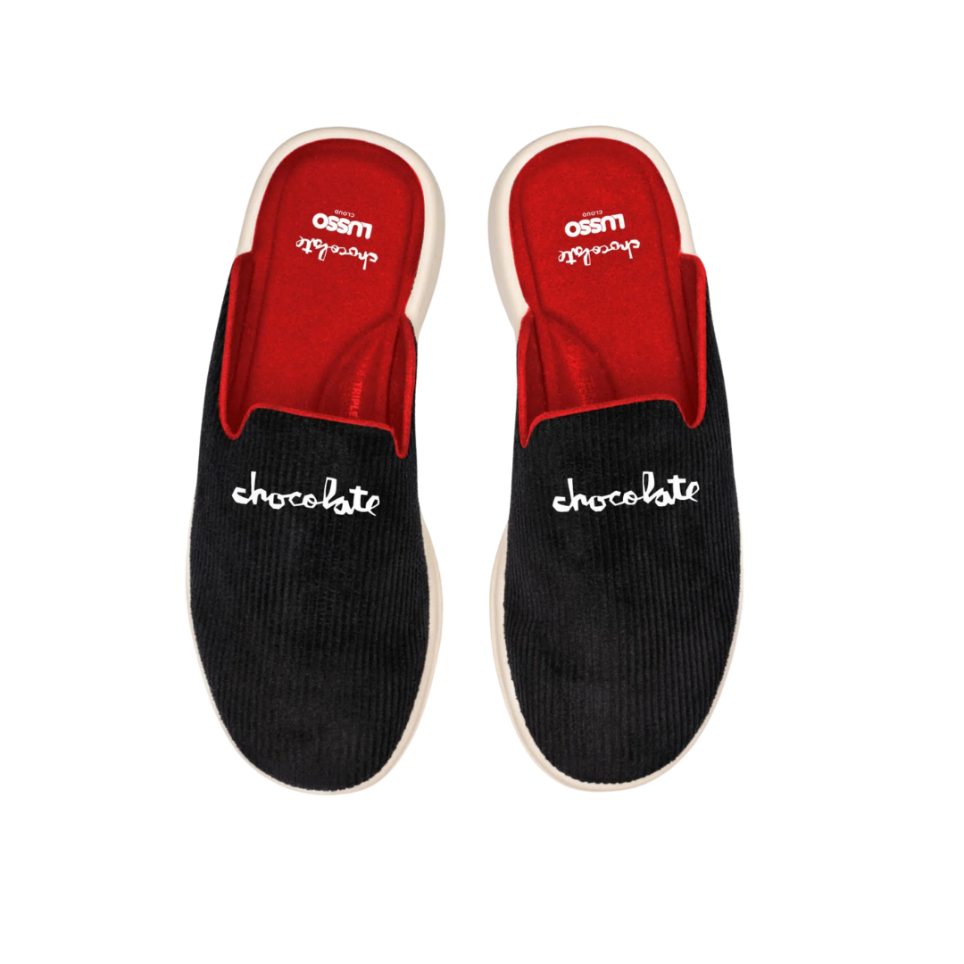 Crailstore Canada. Chocolate x Lusso Pelli Slide Shoes - Top view of black corduroy slides with red footbed and wide comfort strap.
